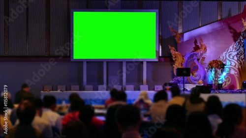 audience watch green screen presentation in seminar conference at exhibition and convention center
