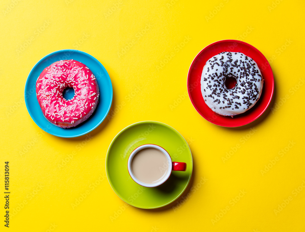 donuts and cup of coffee donuts and cup of coffee
