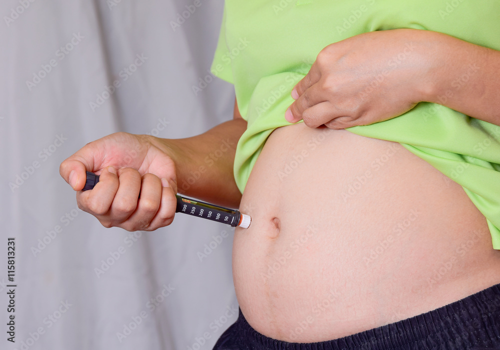 pregnancy woman is injecting Insulin with a Insulin Pen Stock Photo Adobe Stock