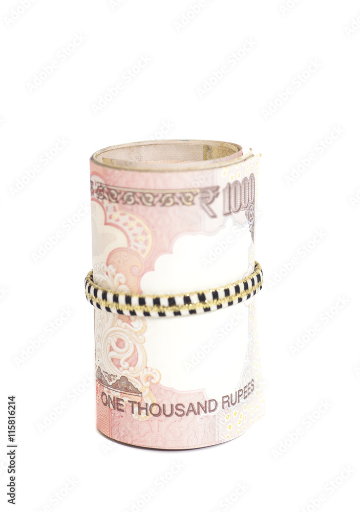 Roll of Indian rupees isolated on white Roll of Indian rupees isolated on white