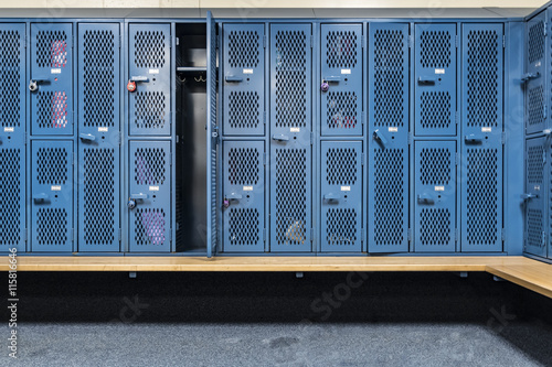 Obraz na plátne Locker room with blue cage lockers