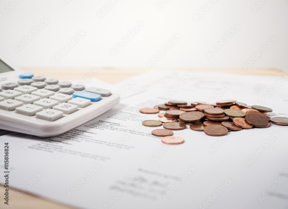 Bill of medication with calculator and coins Bill of medication with calculator and coins