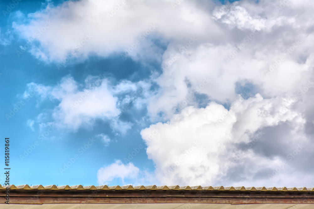 Blue cloudy sky on the roof.
Blue cloudy sky on the roof.