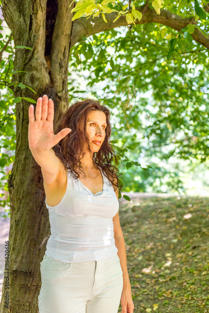 Stop and talk to my hand gesture by mature woman Stop and talk to my hand gesture by mature woman
