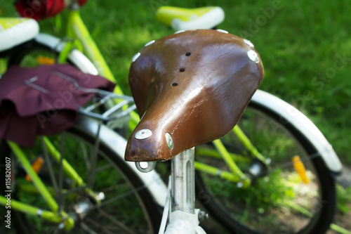 bicycle leather seat with blurred background grass