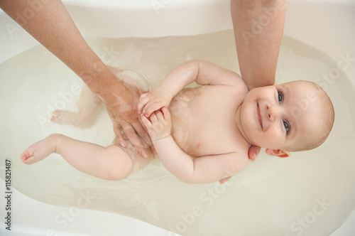 Cute baby bathing