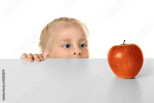 Funny little girl hiding be...