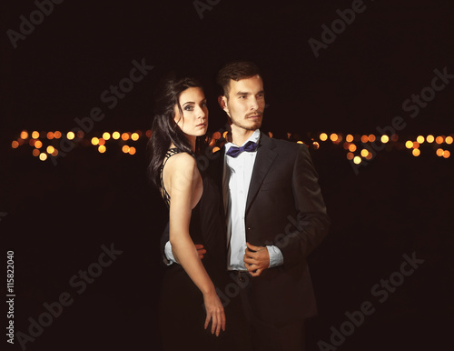 Beautiful young couple posi...