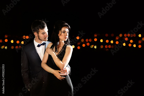 Beautiful young couple posi...