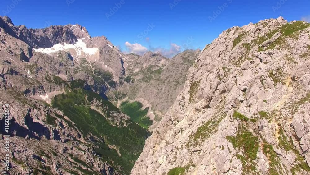 Camera flight over high mountain range. Video from drone. Alpine landscape near Garmisch Paterkirchen in Germany. Amazing places in Central Europe. Destination for hiking, skiing and mountaineering. Camera flight over high mountain range. Video from drone. Alpine landscape near Garmisch Paterkirchen in Germany. Amazing places in Central Europe. Destination for hiking, skiing and mountaineering.