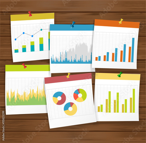 finance business graph with pushpin on wooden board.