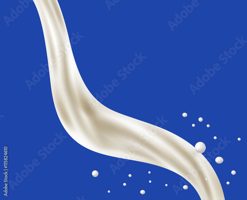 Pouring milk on blue background