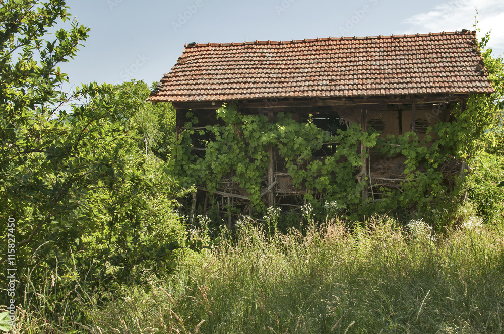 Old rural farm village barn facade with clay wall Old rural farm village barn facade with clay wall