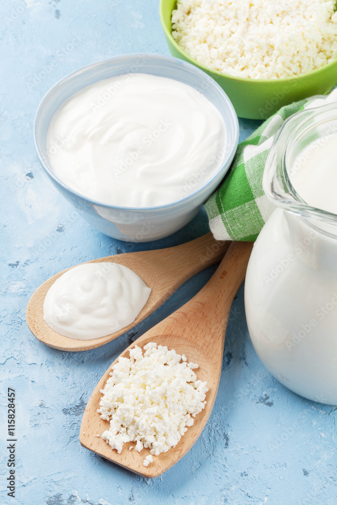 Dairy products on stone table Dairy products on stone table