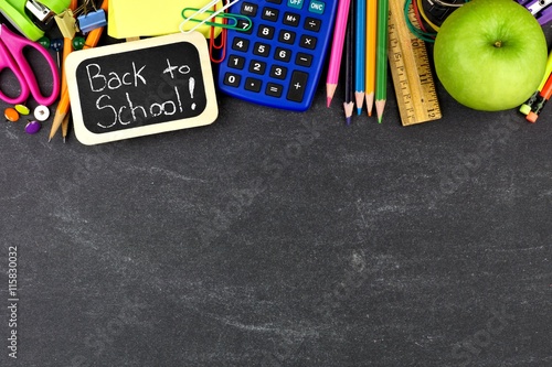 Back to School chalkboard tag with school supplies top border on blackboard background