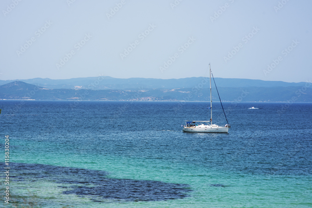 White boat in the sea in Greece