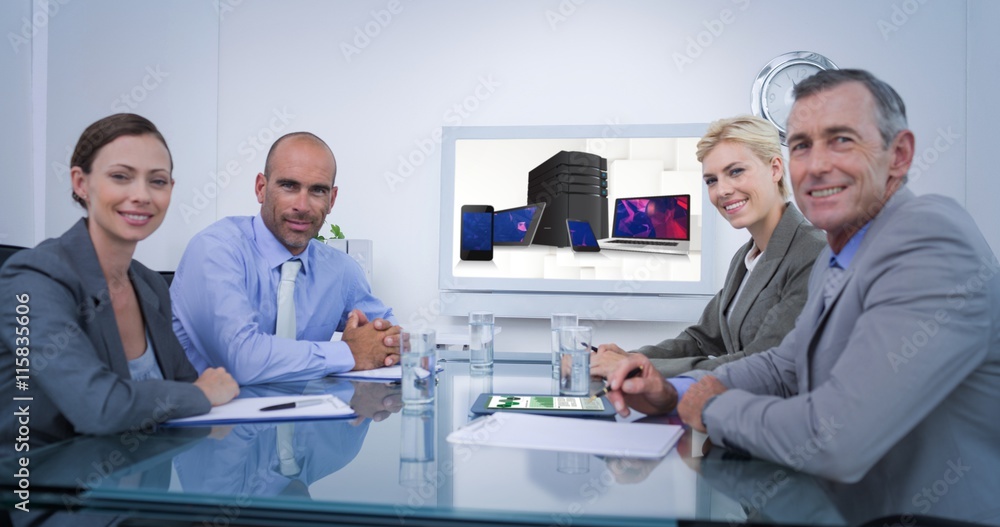 Obraz premium Composite image of business team looking at white screen