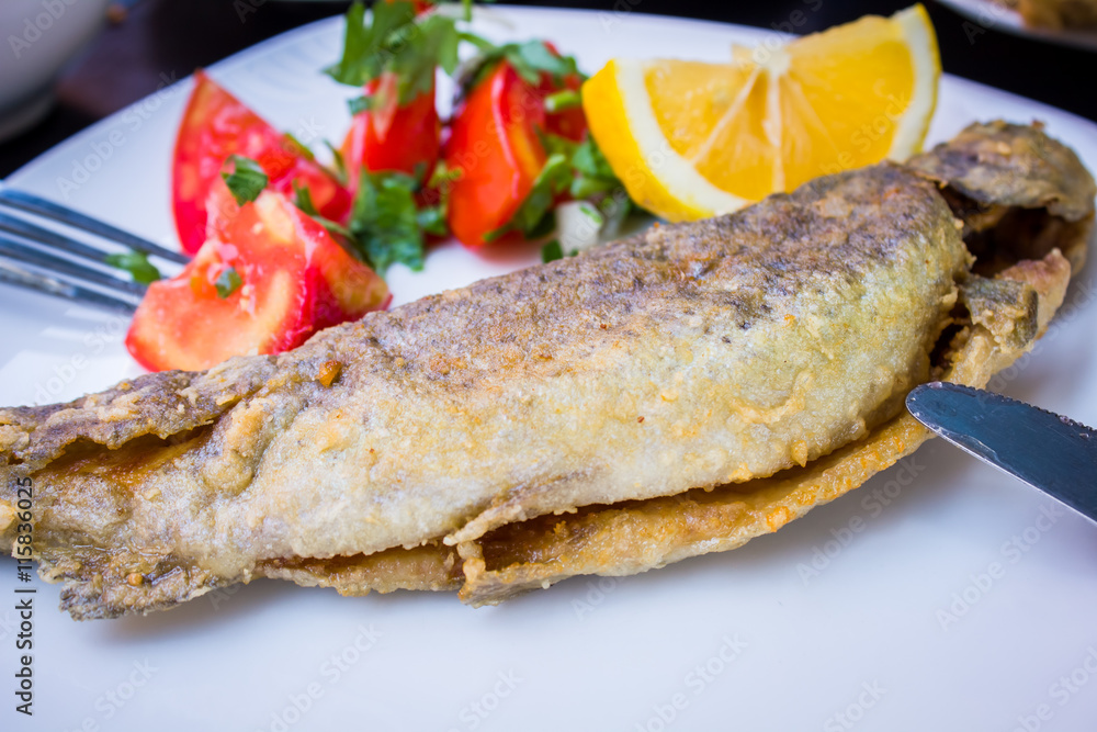 fried fish with fresh herbs and lemon fried fish with fresh herbs and lemon