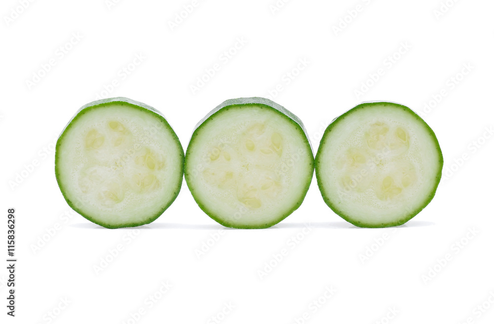 Zucchini sliced on white background Zucchini sliced on white background