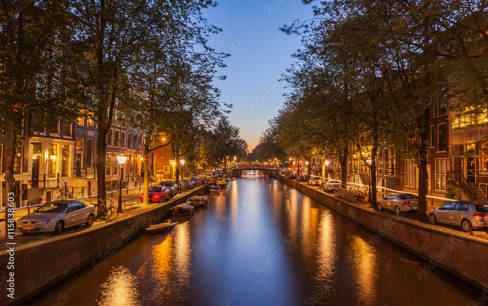 Canal of Amsterdam at twilight sunset