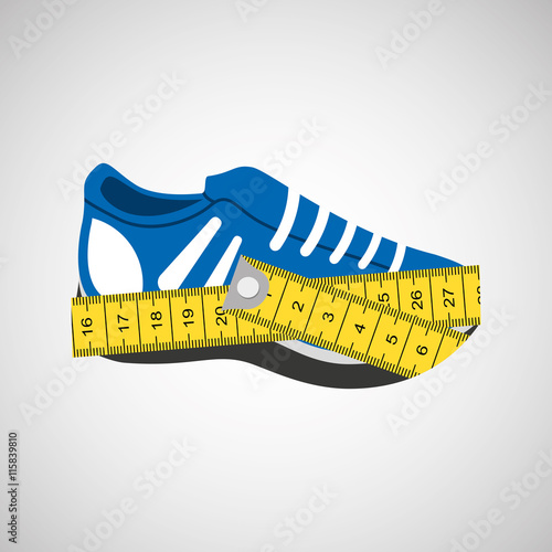 sports shoes and tape measure
