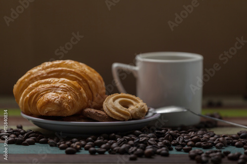 Low light of cookies with coffee beans