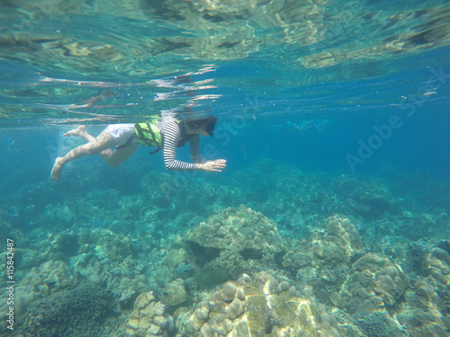 girl is snorkeling in Surin Island, Phang-nga