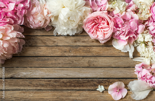 beautiful flowers on wooden background, various , place for text, closeup © puhimec