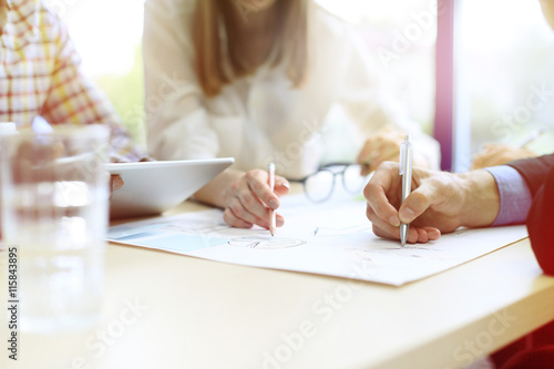 Image of business people hands working with papers at meeting © ty