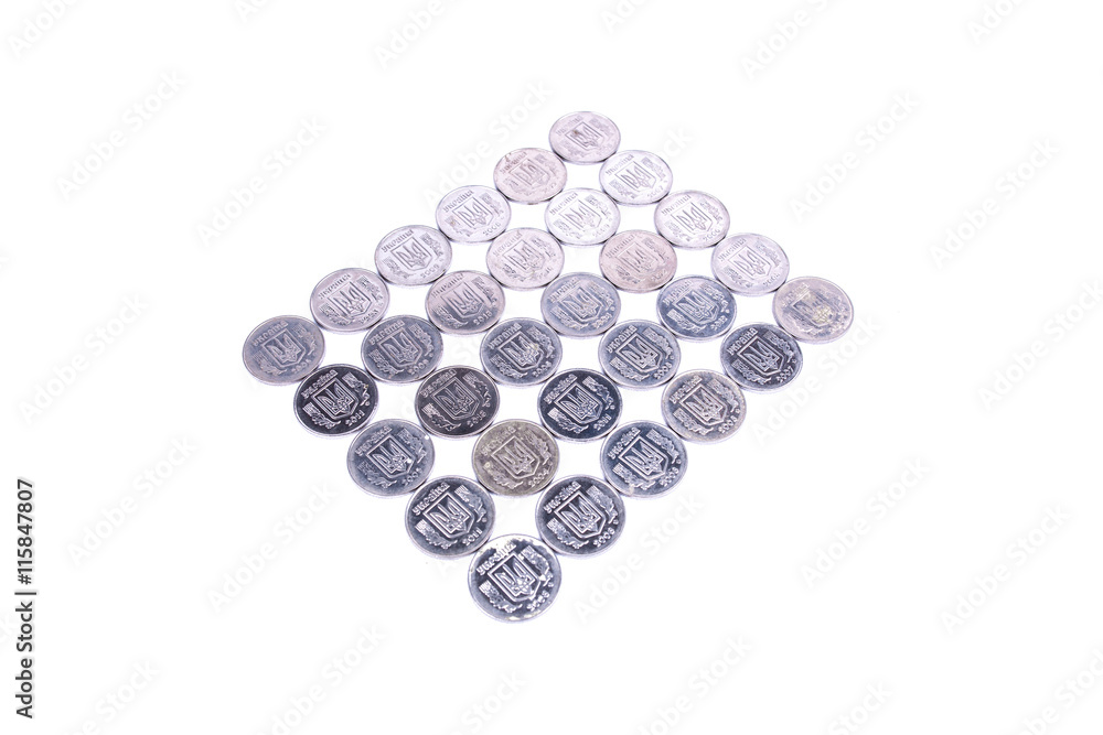 coins of Ukrainian hryvnias on white background coins of Ukrainian hryvnias on white background