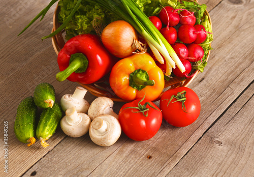 Fresh vegetables on a clean wooden table