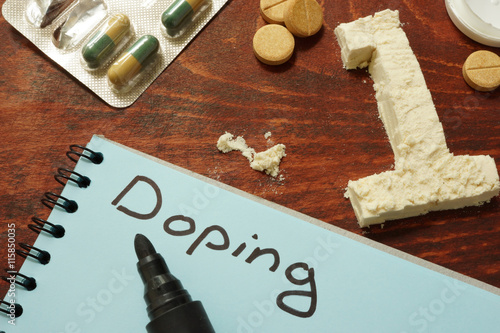 Notebook with  sign Doping, number one from powder,  pills and supplements.