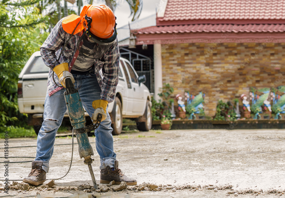 Workers use Concrete Breaker Electric Workers use Concrete Breaker Electric