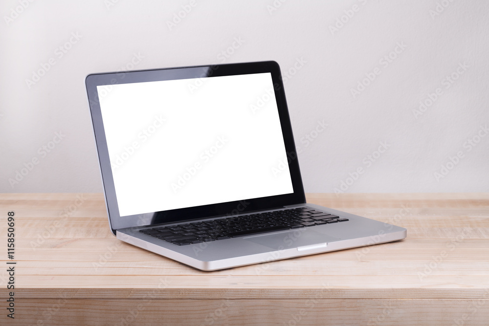 Front view of the laptop is on the work table concrete backgroun Front view of the laptop is on the work table concrete backgroun
