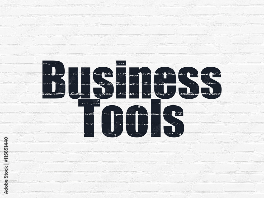 Business concept: Business Tools on wall background Business concept: Business Tools on wall background