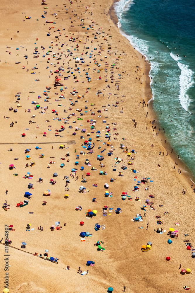 Beach from Above with Many Umbrellas and People