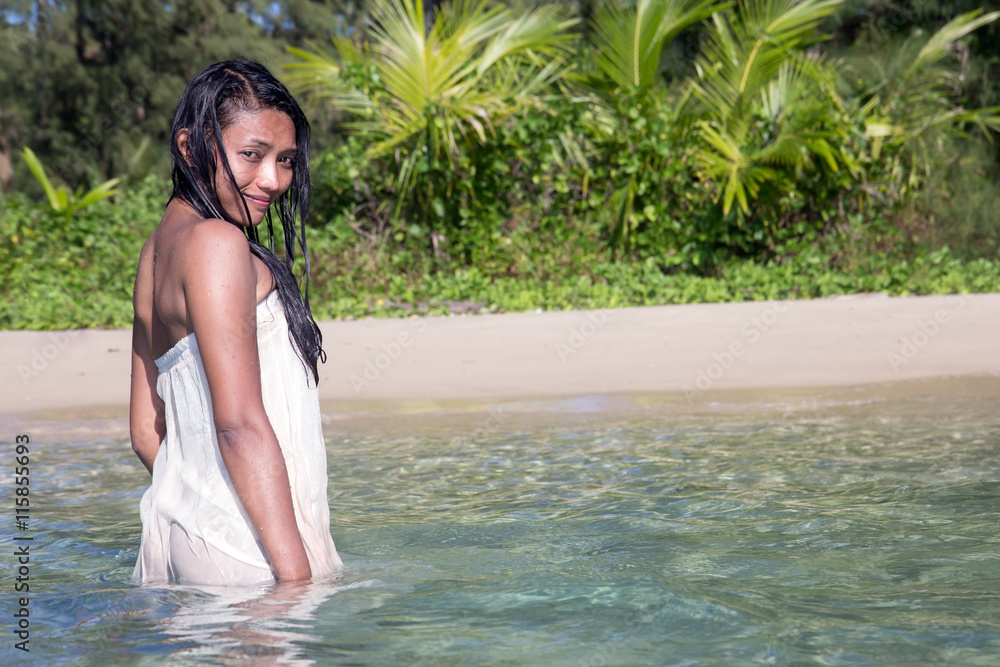 woman in a white wet dress in the sea Stock Photo | Adobe Stock