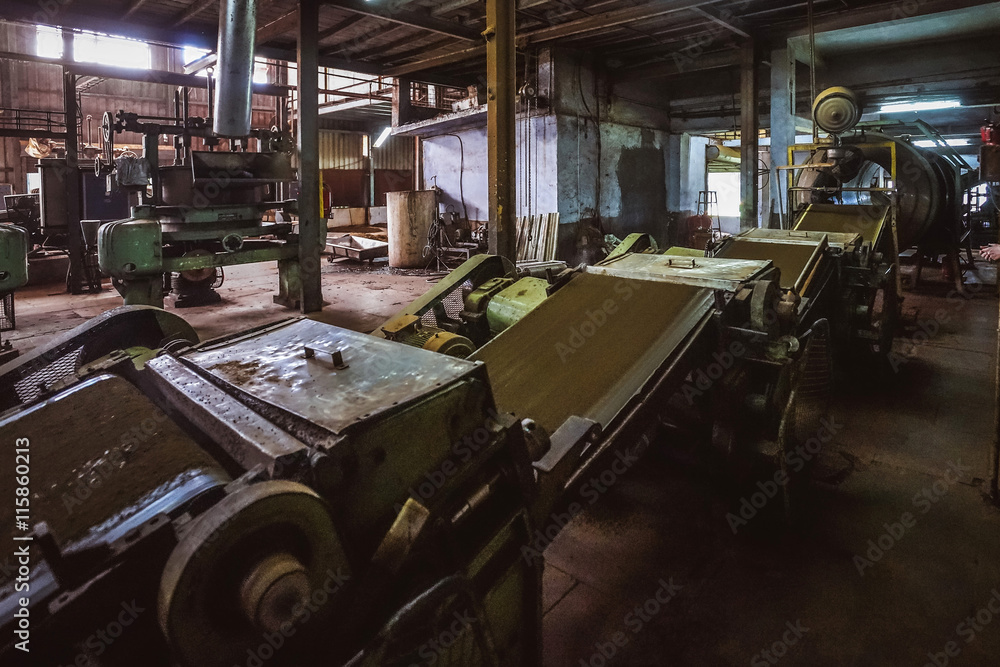 Machines processing tea laeves in a tea factory in India