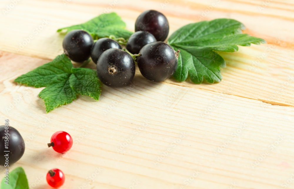 organic garden berries on old wood table, from above organic garden berries on old wood table, from above