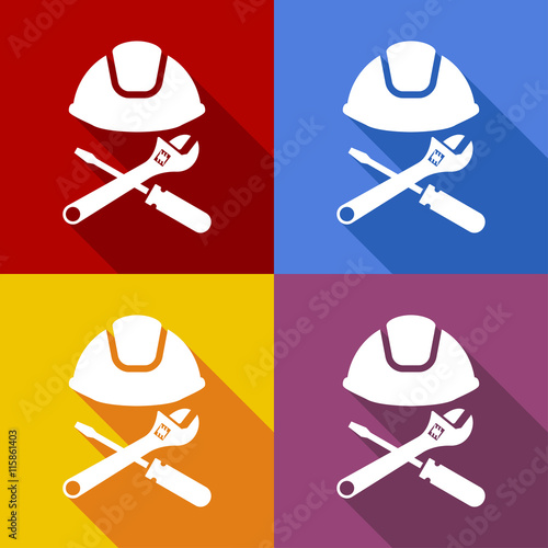 Icono plano casco con herramientas cruzadas con sombra en varios colores