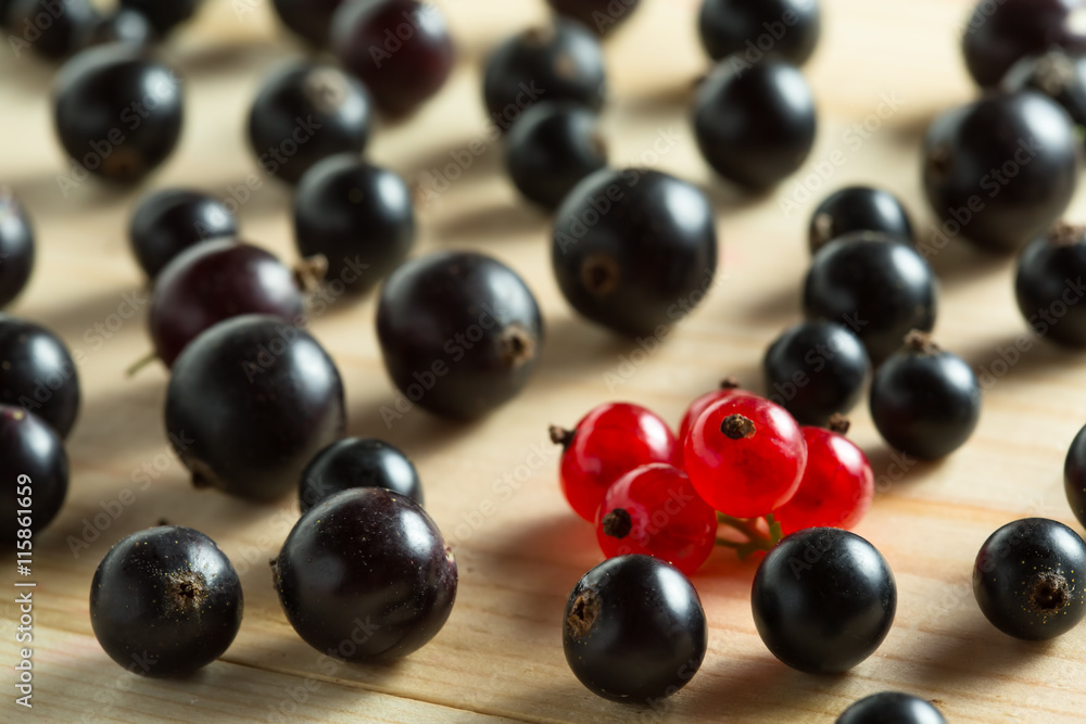 border of fresh berries mix on wooden tabletop border of fresh berries mix on wooden tabletop