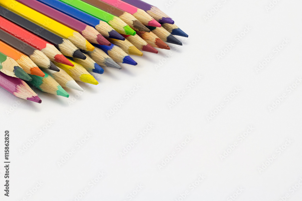 Frame of multicolored pencils isolated on white background