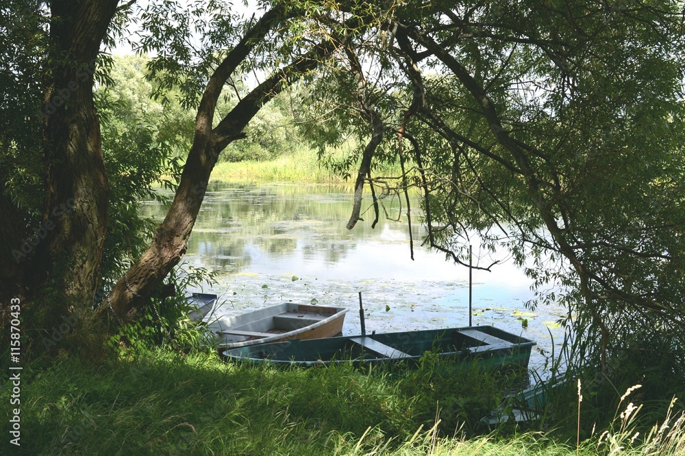 Boats on Havel river in summer time (Havelland, Germany) Boats on Havel river in summer time (Havelland, Germany)