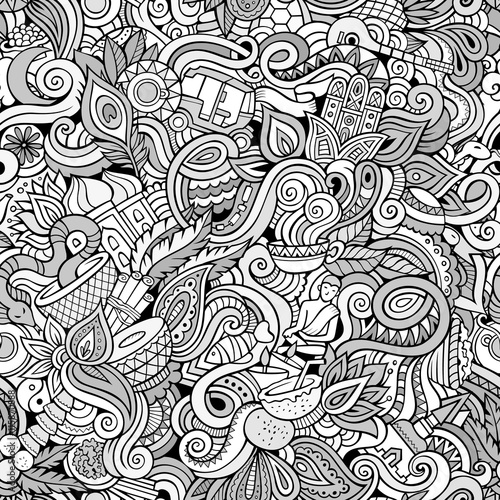 Cartoon hand-drawn doodles on the subject of Indian style theme seamless pattern