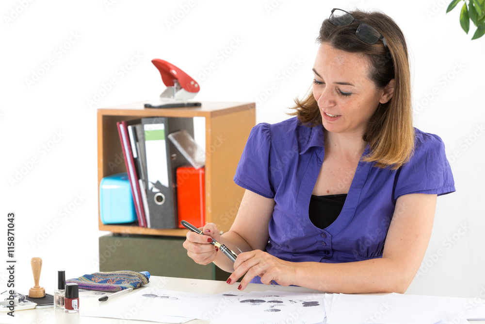 Cute office worker signing documents Cute office worker signing documents
