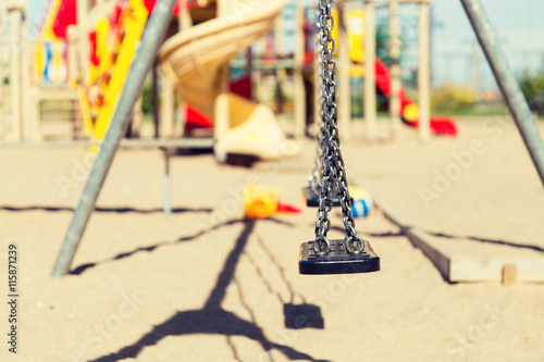 close up of swing on playground outdoors