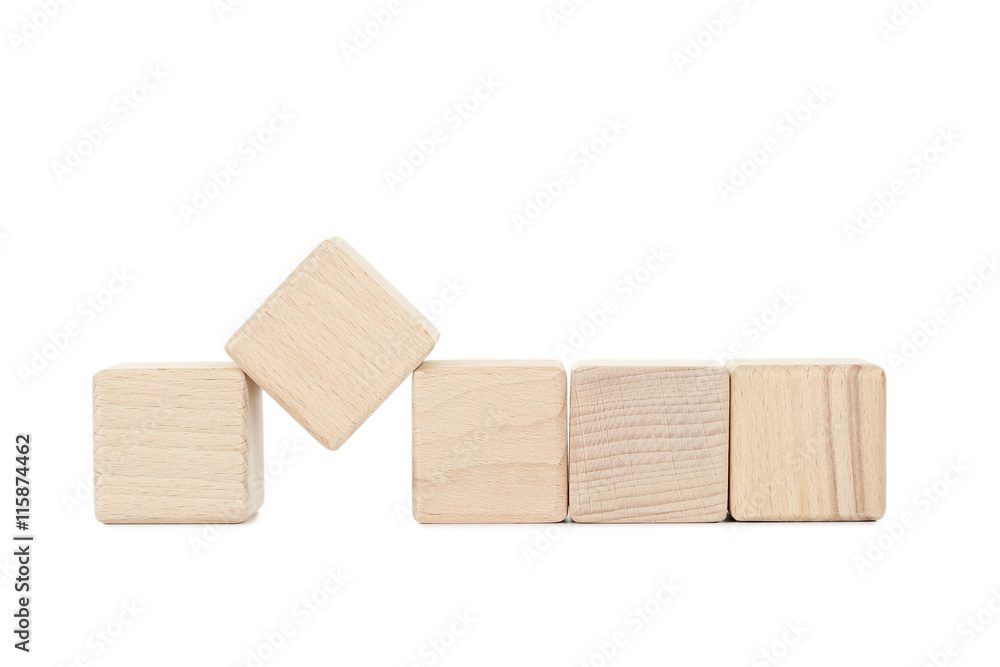 Wooden toy cubes isolated on a white Wooden toy cubes isolated on a white
