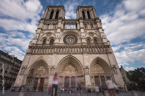 Notre Dame de Paris. France. Ancient catholic cathedral on the quay of a river Seine. Famous touristic architecture landmark in summer