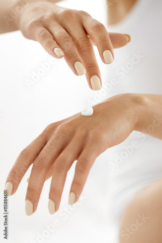 Woman Hands With Cream. Closeup Of Female Hands Applying Lotion