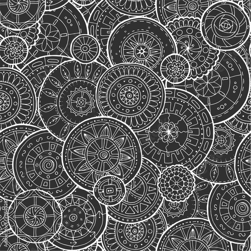 Fototapeta Naklejka Na Ścianę i Meble -  Ethnic floral mandalas, doodle background circles in vector. Seamless pattern. 